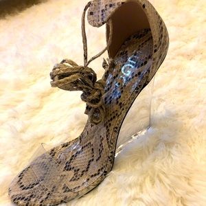 Nude snakeskin wrap-up heel